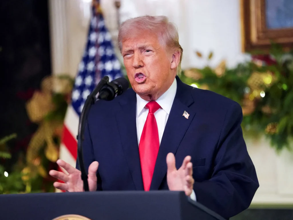 Trump’s spitting image is lining up a fresh con for America