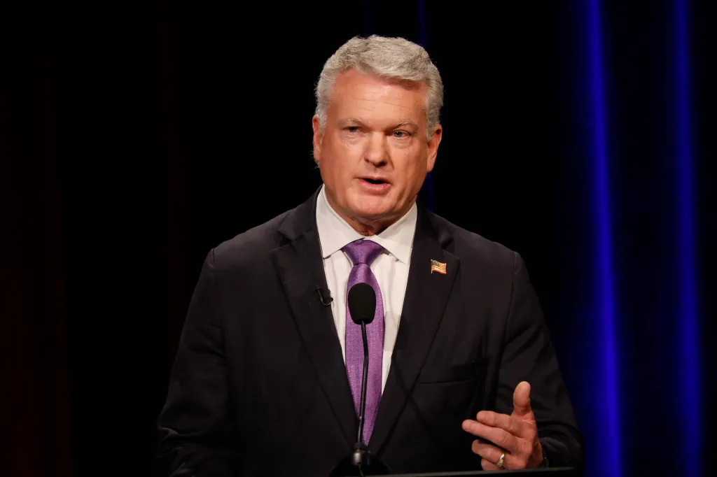 U.S. Rep. Mike Collins speaking at a debate.