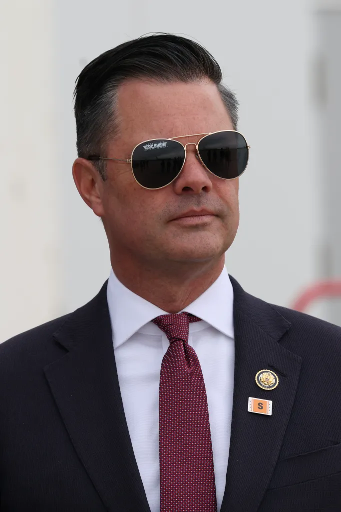 U.S. Representative Zach Nunn wearing aviator sunglasses.