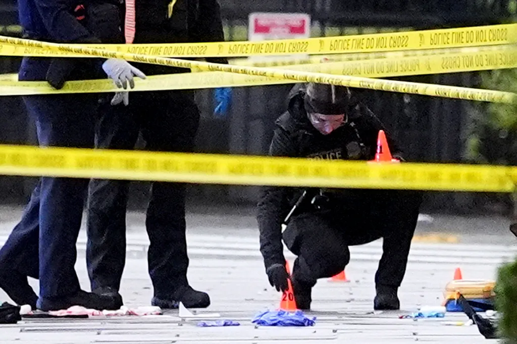 Secret Service police placing evidence markers at a crime scene near the White House.