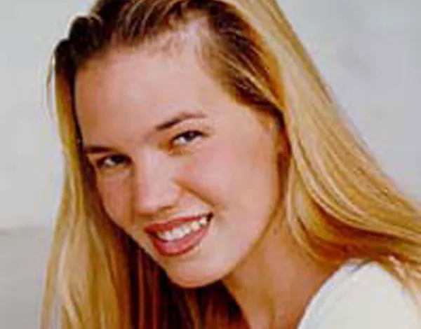 Headshot of missing college student Kristin Smart, a young woman with long blonde hair, smiling at the camera.