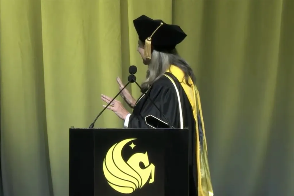 Caulfield gestures off stage wondering why her remarks were met with a reaction during the ceremony.