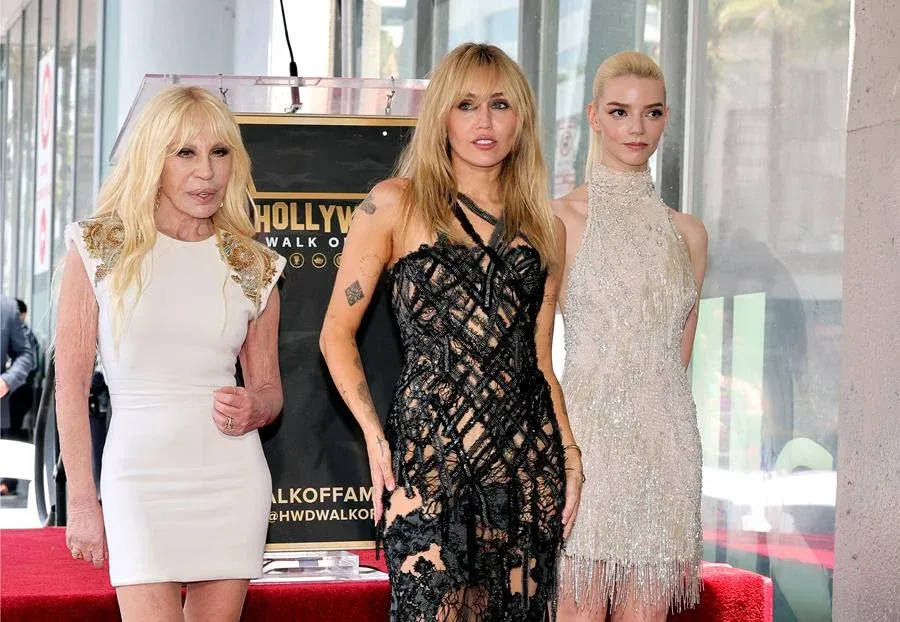 Donatella Versace, Miley Cyrus and Anya Taylor-Joy attend the Hollywood Walk of Fame Star ceremony honoring Miley Cyrus on May 22, 2026 in Hollywood, California. Source: Getty