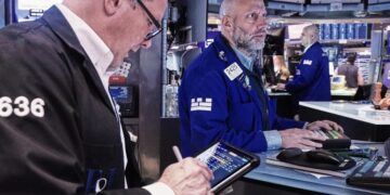 Stocks inch to more records after oil prices drop