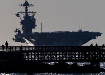 Aircraft carrier USS Ford returns home after 11-month deployment off Venezuela and Iran