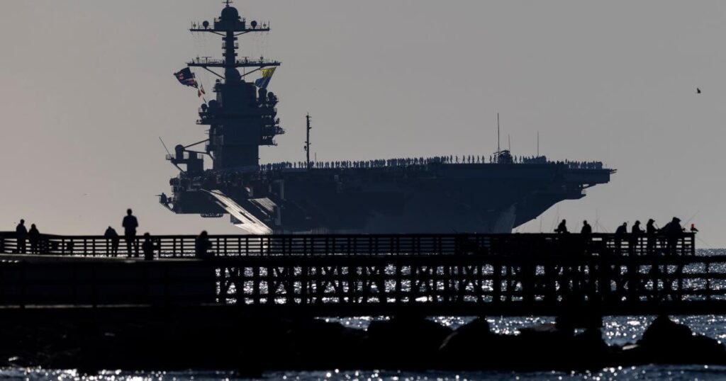 Aircraft carrier USS Ford returns home after 11-month deployment off Venezuela and Iran
