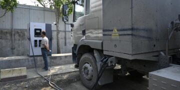 Chinese truck drivers are going electric as gas prices soar