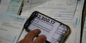As electric bills rise in the AI boom, states take aim at utilities’ profits