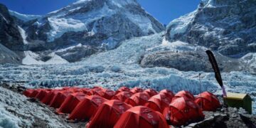 Mount Everest season opens late, with climbers undeterred by huge ice block and high travel costs