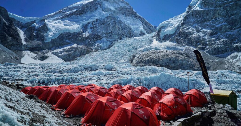 Mount Everest season opens late, with climbers undeterred by huge ice block and high travel costs