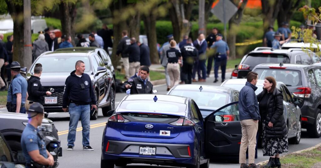 Man with an assault rifle sprays rounds at drivers near Boston, wounding 2 before being shot