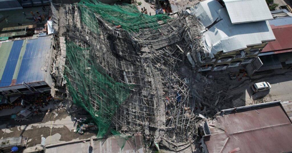 Building under construction in Philippines collapses, leaving 1 dead and 21 trapped
