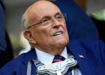 Giuliani is breathing on his own while hospitalized with pneumonia, spokesperson says