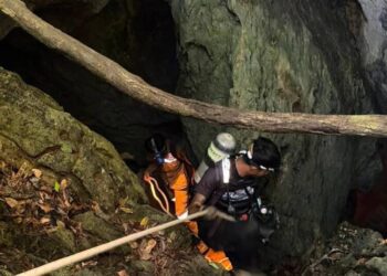 Heavy rains threaten to delay search for 2 people still missing in Laos cave