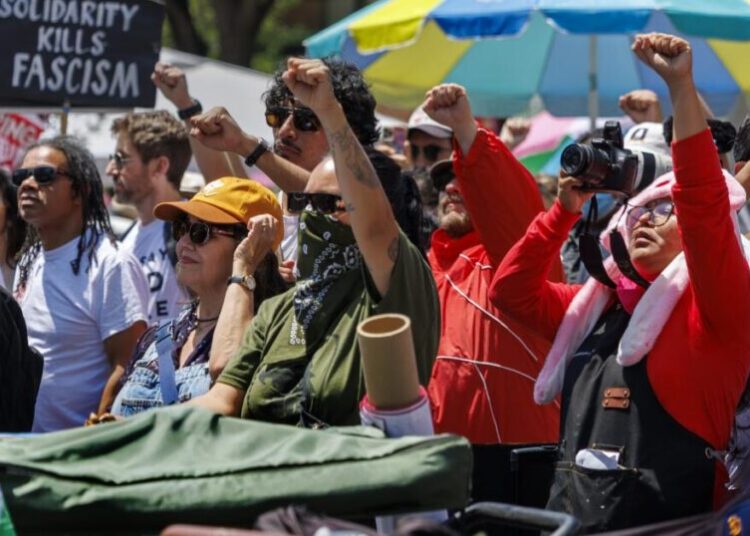 Thousands rally in L.A. for May Day to protest immigration sweeps, high cost of living