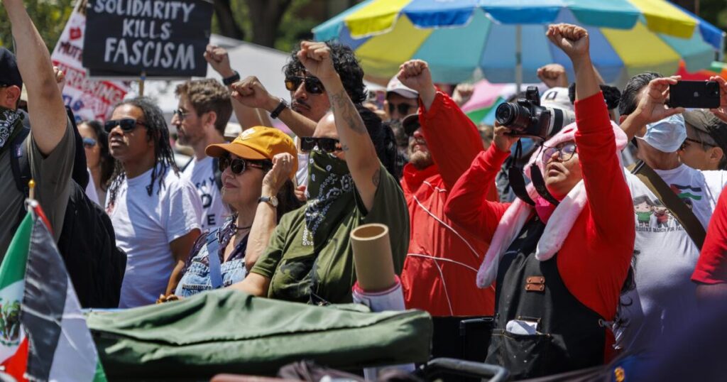 Thousands rally in L.A. for May Day to protest immigration sweeps, high cost of living