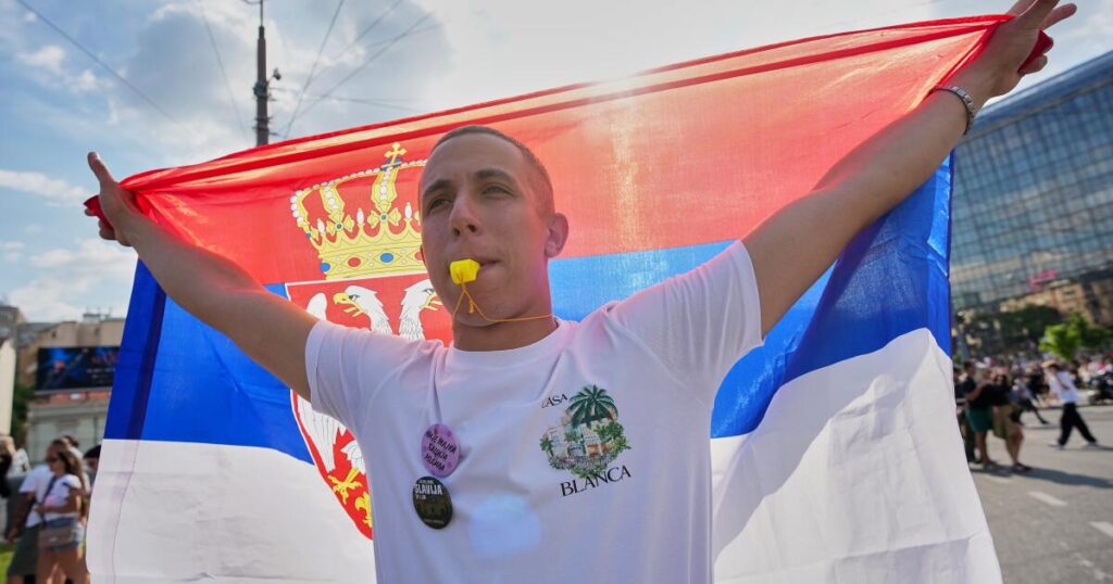 Protesters clash with police after an anti-government rally in Serbia’s capital