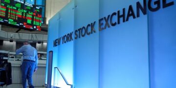Stocks fall from their records as oil prices yo-yo