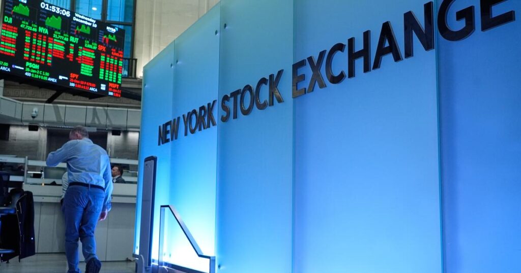 Stocks fall from their records as oil prices yo-yo