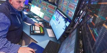 Wall Street rallies to records after oil prices ease and corporate profits keep topping expectations