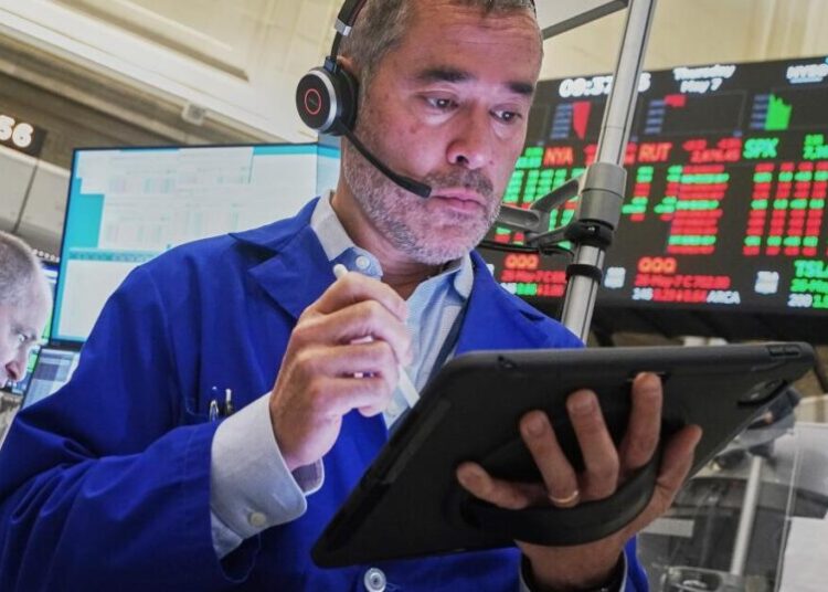 Stocks rise to records after a solid jobs report overshadows higher oil prices