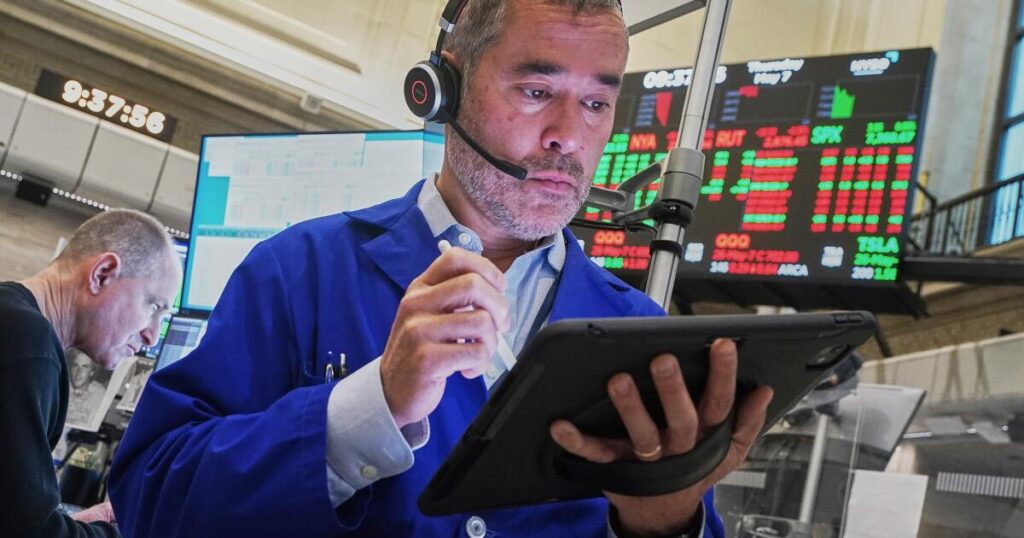 Stocks rise to records after a solid jobs report overshadows higher oil prices