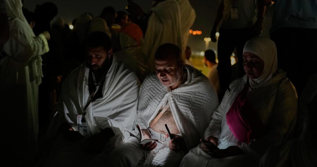 Muslim pilgrims converge on Arafat for prayers and worship as Hajj reaches its peak