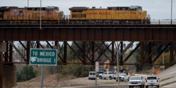 Heat stroke is suspected among 6 found dead in shipping container at a rail yard near Texas border