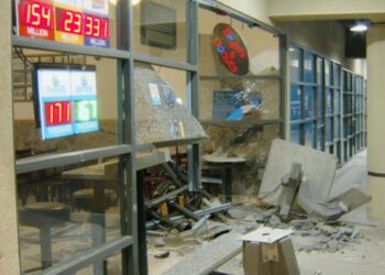 Doughnut shop was closed, so he drove into it, then tried to run over officer, police say