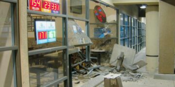 Doughnut shop was closed, so he drove into it, then tried to run over officer, police say