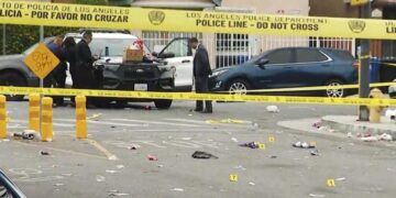One woman killed, another wounded in overnight shooting near a vigil in Watts