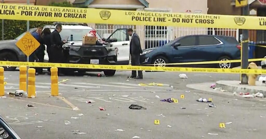 One woman killed, another wounded in overnight shooting near a vigil in Watts