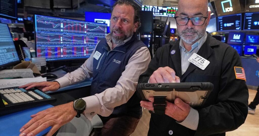 Stocks fall further from their records after bond markets crank up the pressure