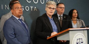 Minnesota county charges ICE officer in nonfatal shooting during Trump’s immigration crackdown