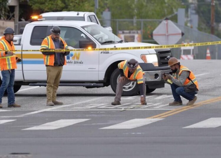Crude oil spills onto Cesar Chavez Avenue in East L.A. after pipeline rupture