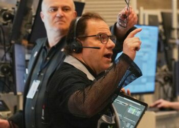 Wall Street falls from its records and oil prices jump after fighting flares in the Mideast