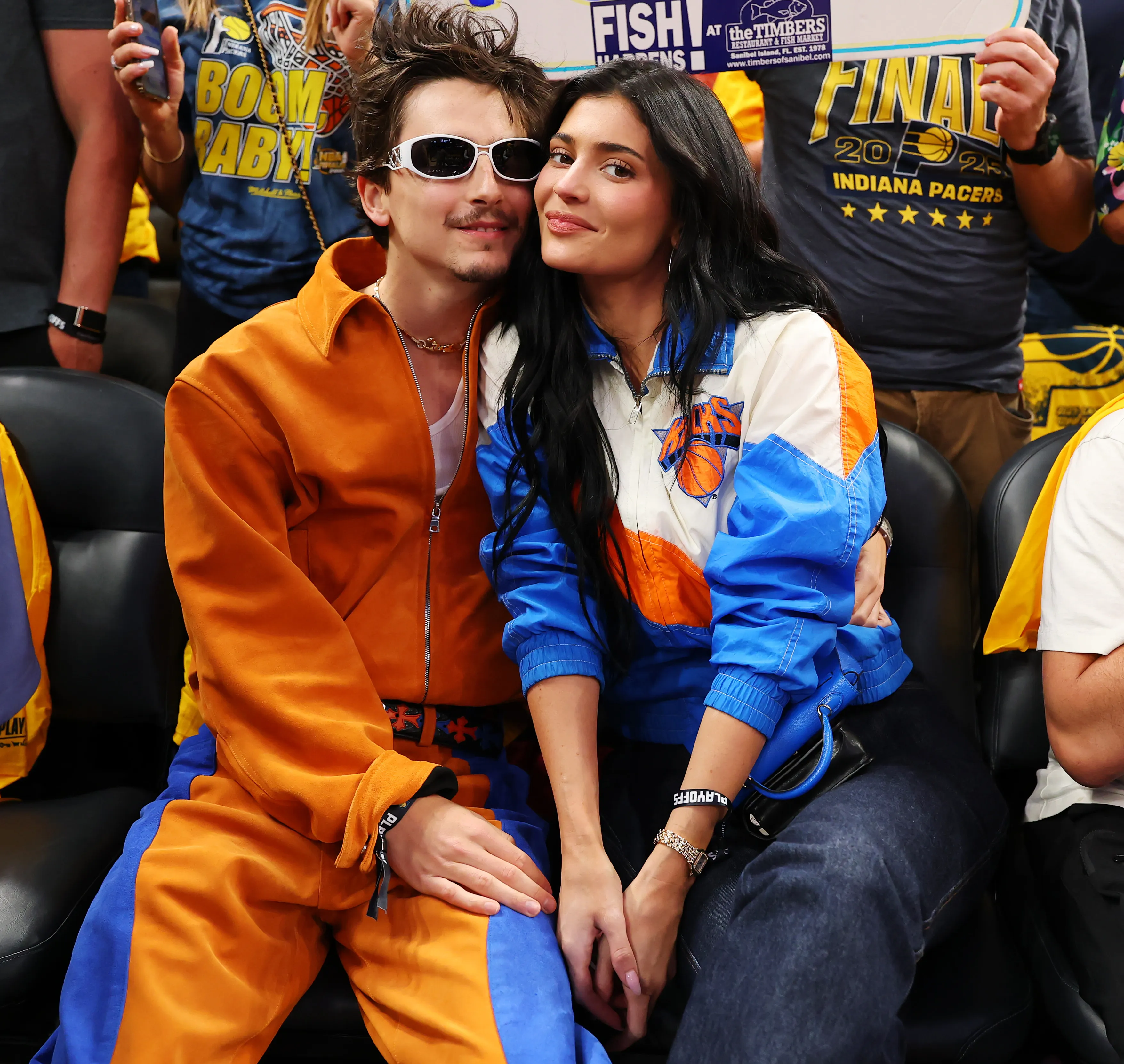 Timothee Chalamet and Kylie Jenner attend an NBA game.