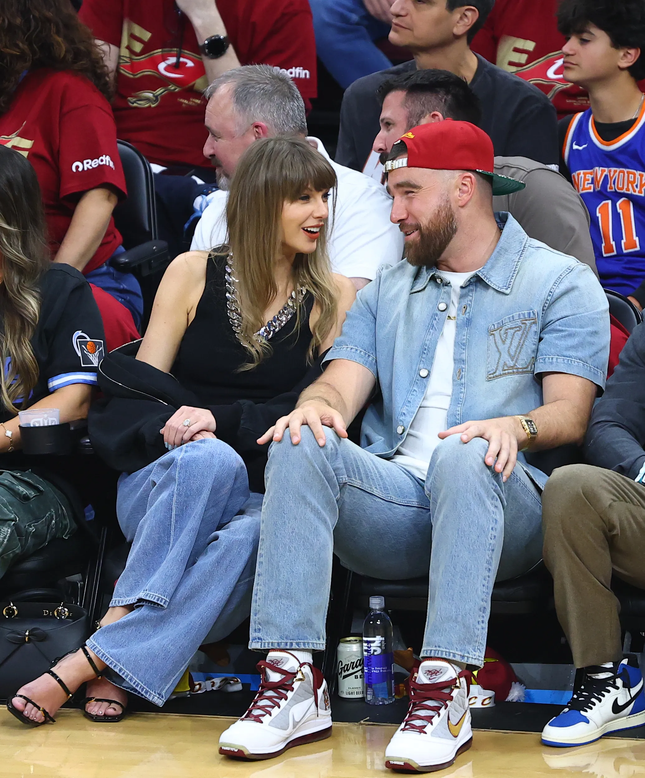 Travis Kelce and Taylor Swift attending Game Three of the 2026 Eastern Conference Finals.