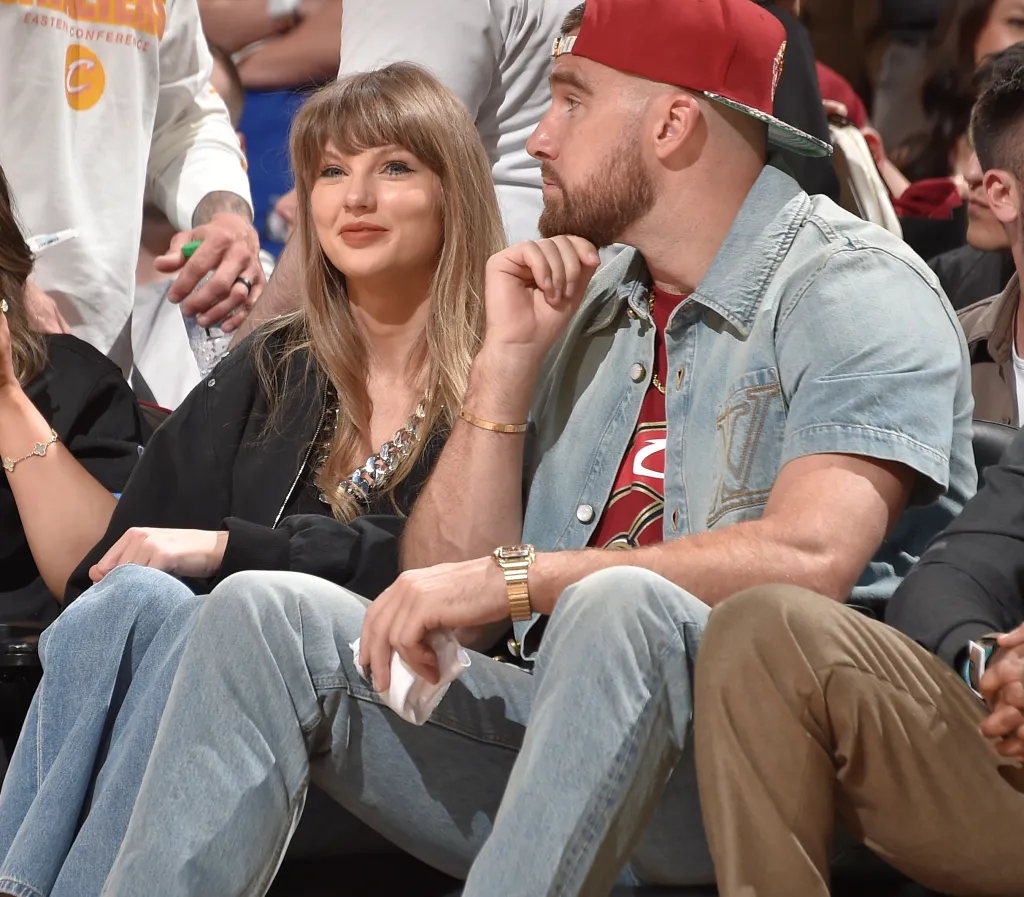 Taylor Swift and Travis Kelce watching the Cavaliers vs. Knicks game.