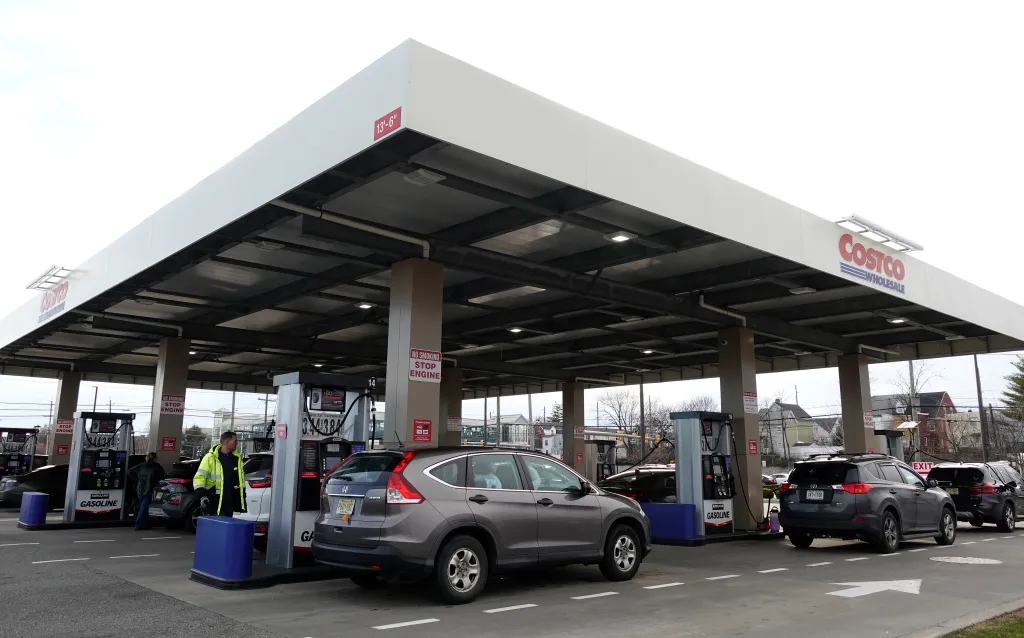 Vehicles refuel at a Costco Wholesale gas station in Bayonne, New Jersey.