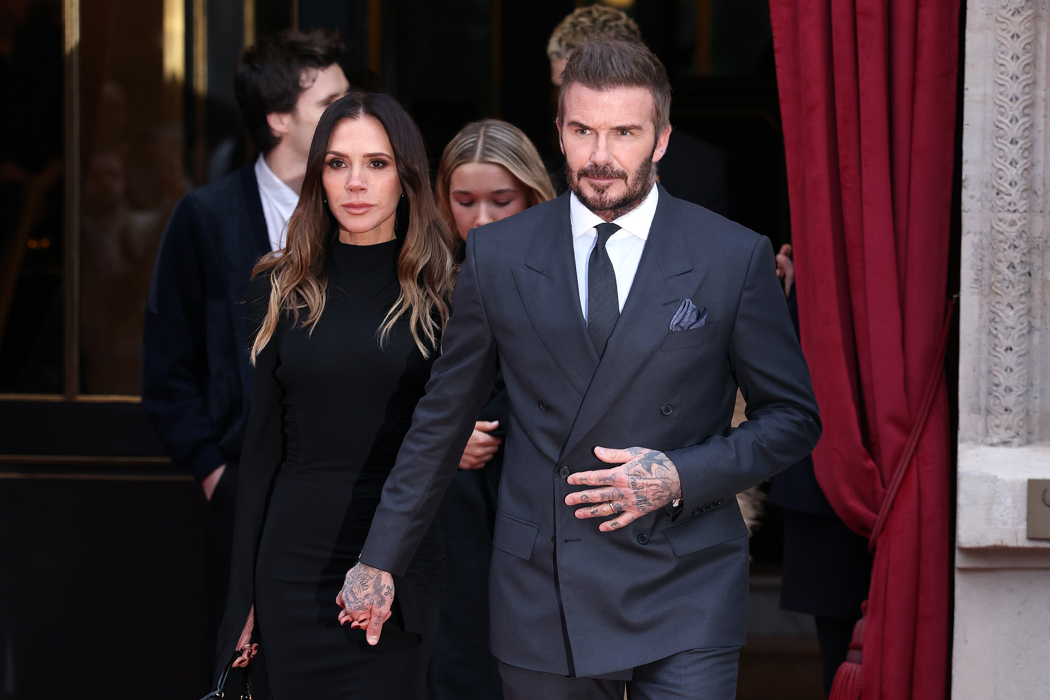 Victoria and David Beckham and their family leaving a hotel during Paris Fashion Week.
