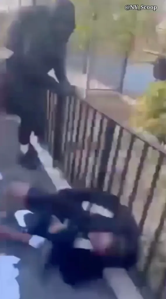 Still from a video showing the moment 15-year-old Jaden Pierre was fatally shot at a park in Queens.