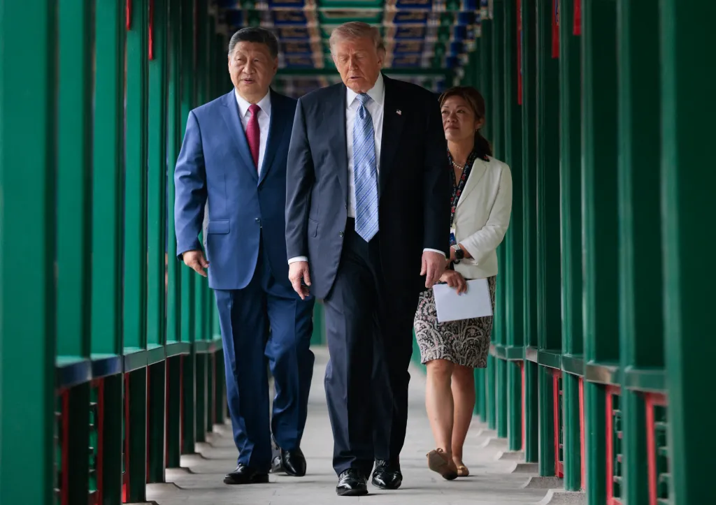 President Donald Trump walks ahead of Chinese President Xi Jinping during a tour of the Zhongnanhai Garden on May 15, 2026.