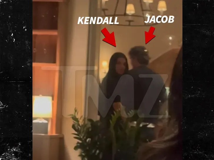Kendall Jenner and Jacob Elordi entering a restaurant.