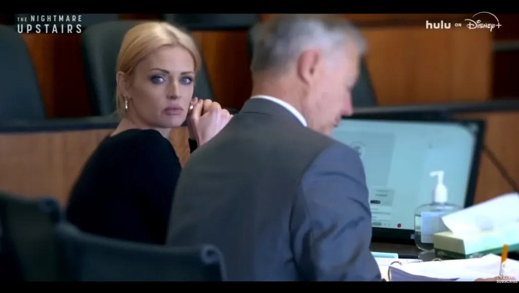 Brynlee Larson sitting in a courtroom during a wild custody battle.