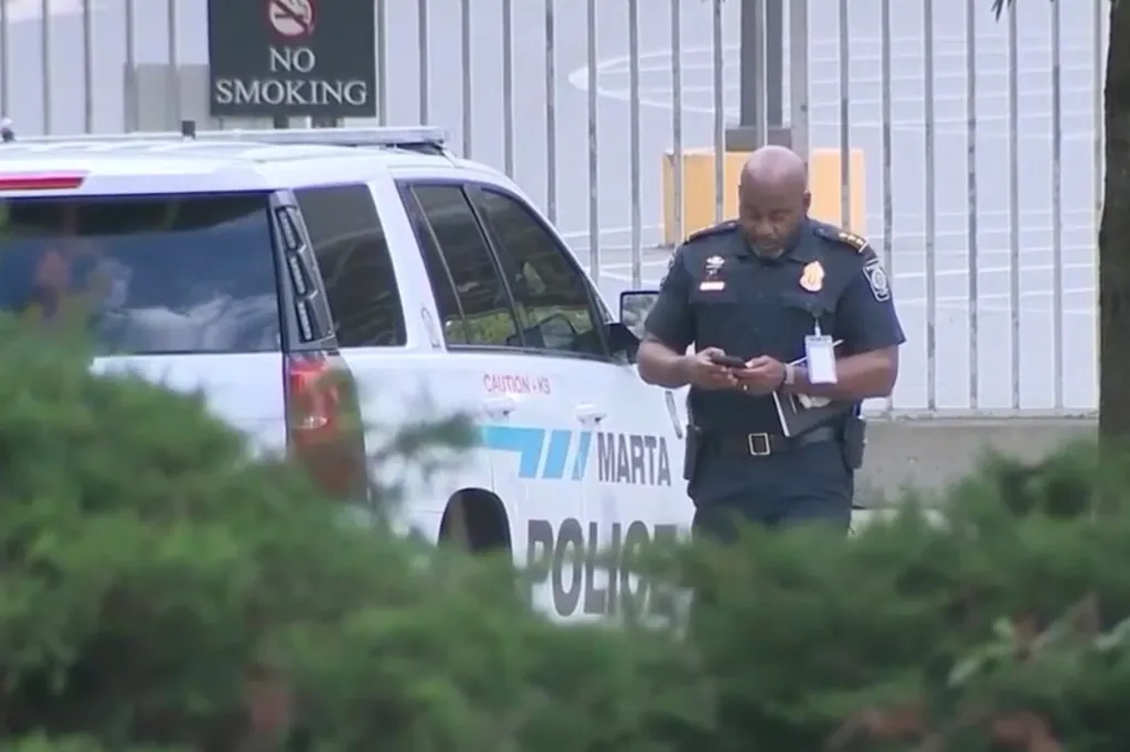 Police investigate the scene outside the MARTA Oakland City Station on May 30, 2026.