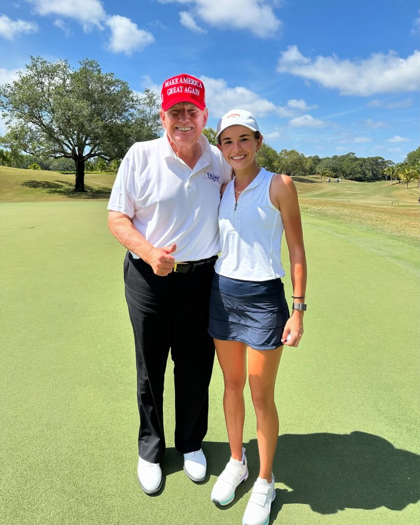 Donald Trump and Kai Trump posing for a photo on a golf course.