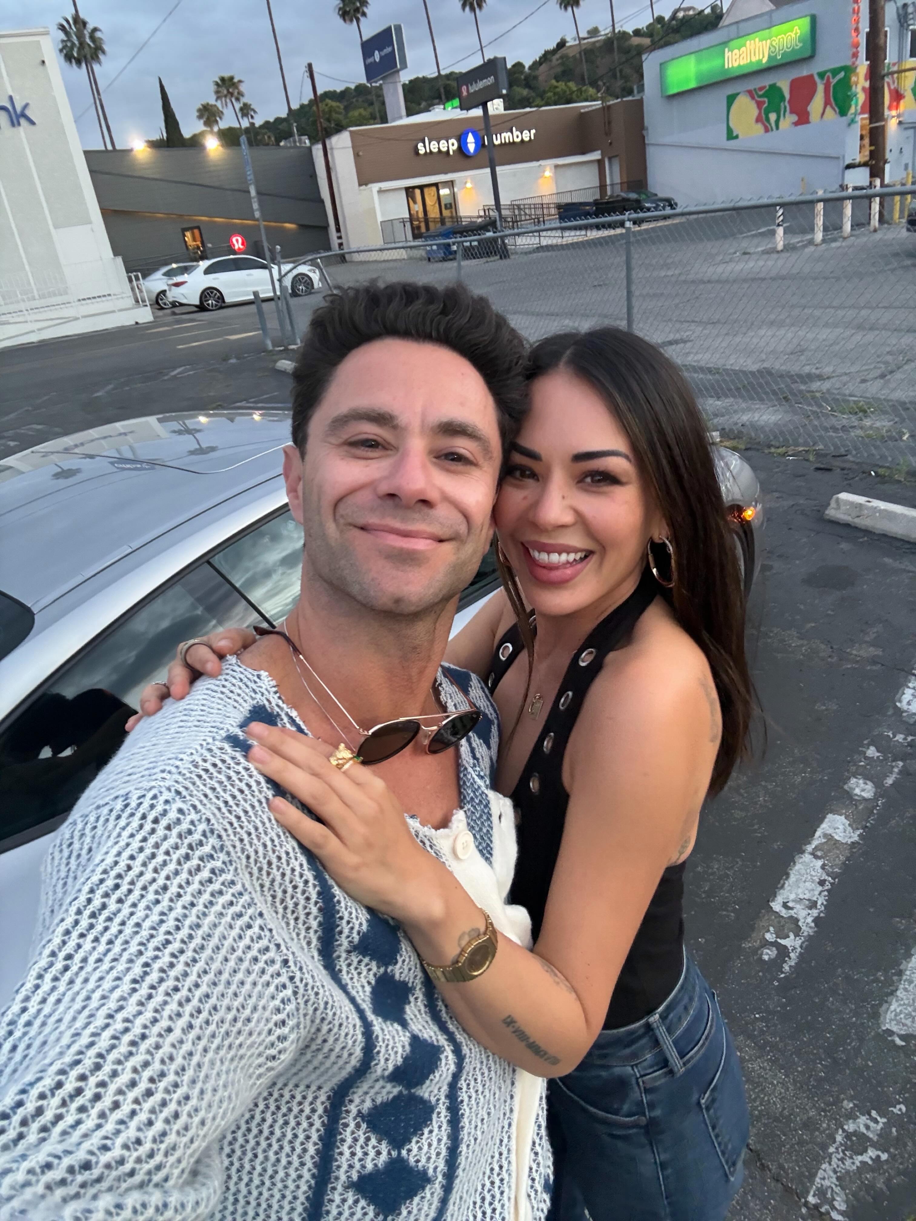 Janel Parrish and Sasha Farber taking a selfie together.