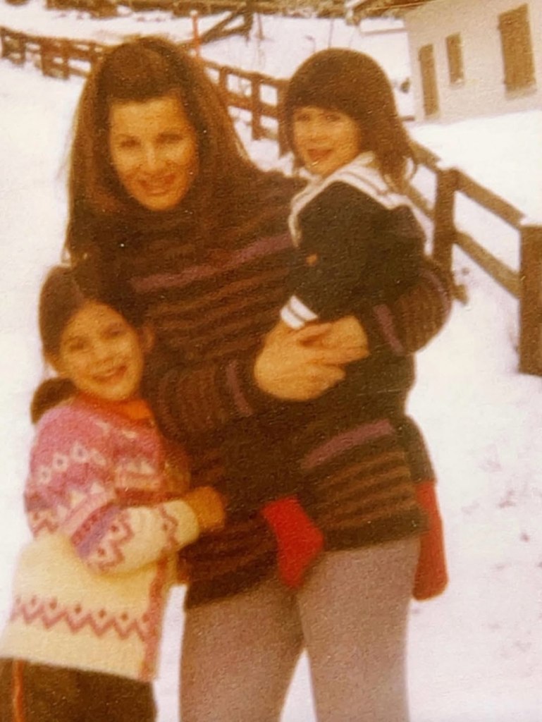 Sandra Bullock with her mother and sister in the snow.