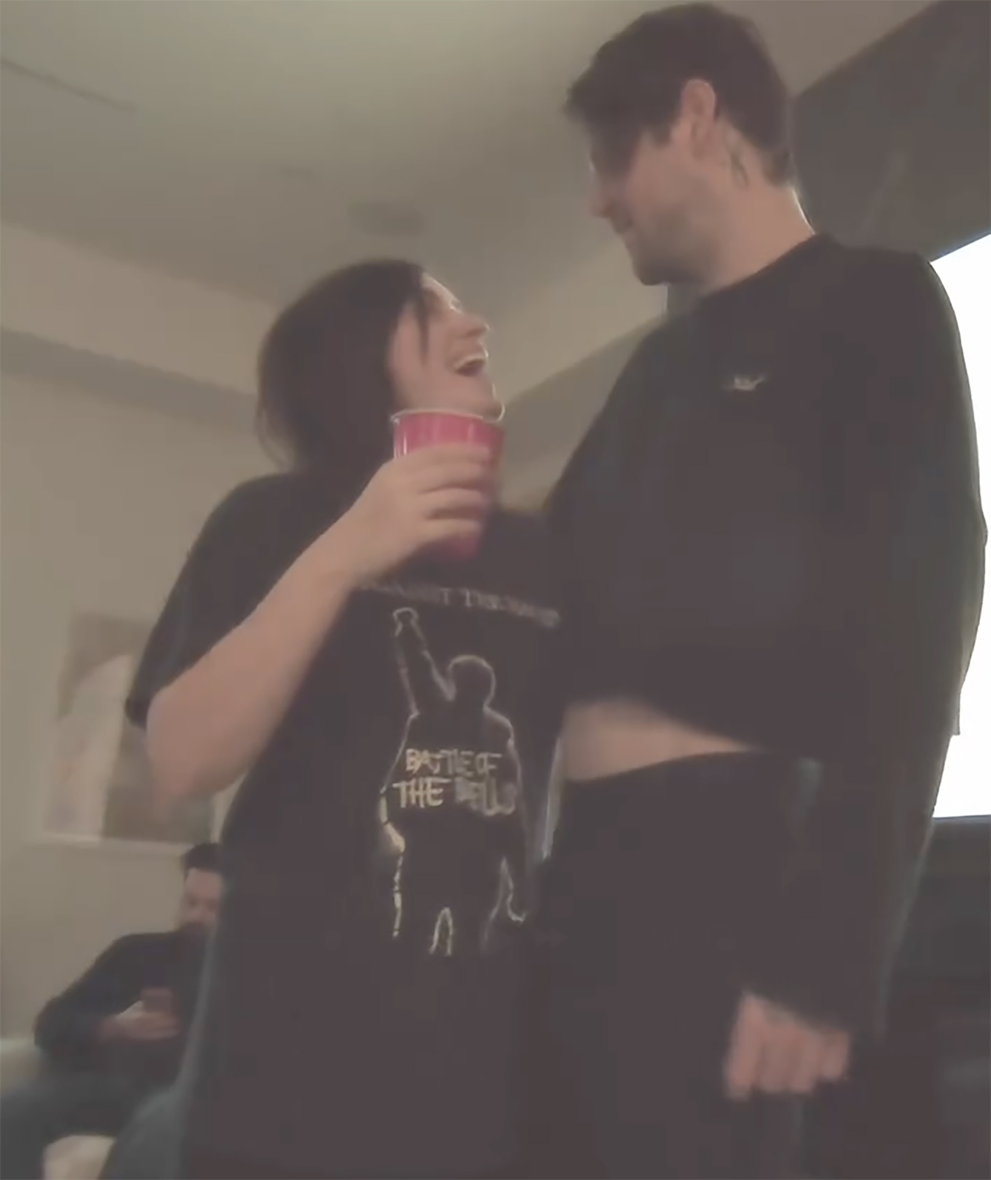 Beartooth rockstar Caleb Shomo and his wife in a candid photo.